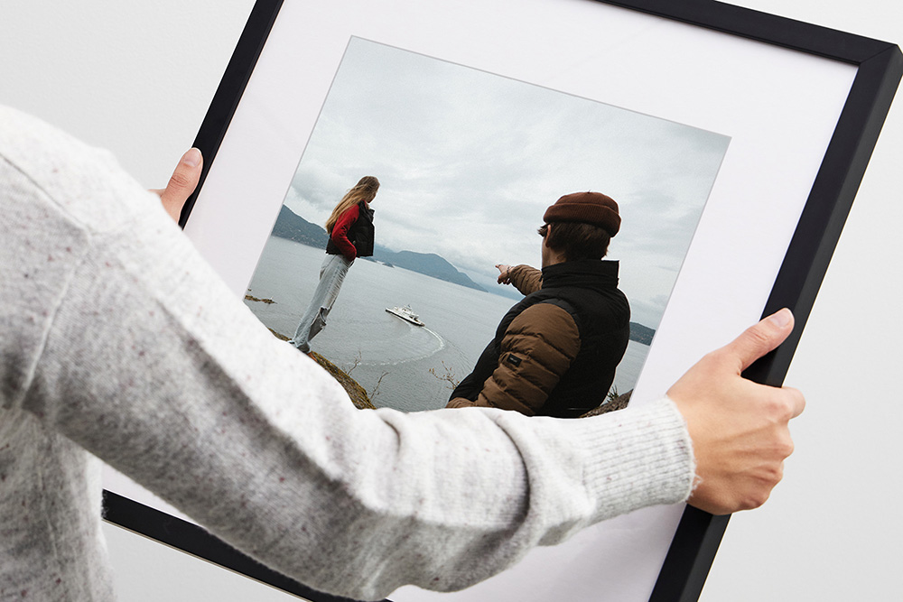 woman holding a frame lab frame