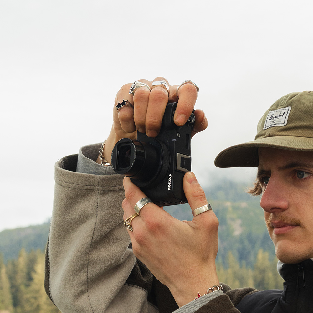 Man shooting vertically with a PowerShot V1