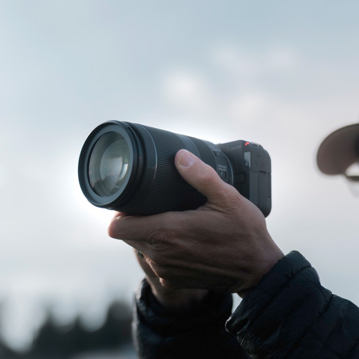 man shooting with a EOS R50 V