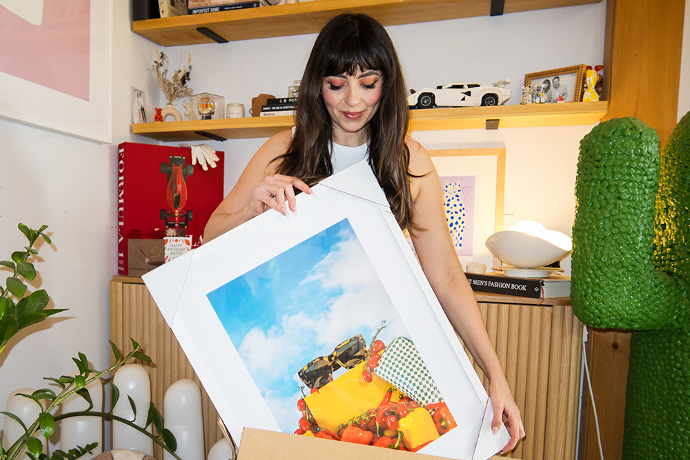 woman holding a Frame Lab frame