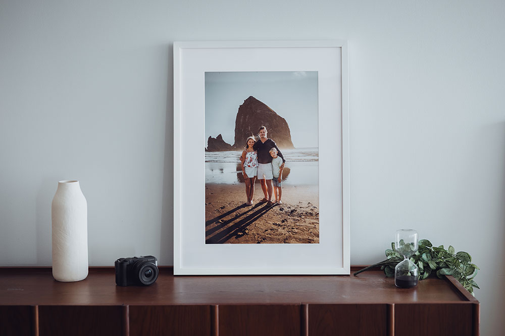 Frame lab frame of a man and his children on a beach