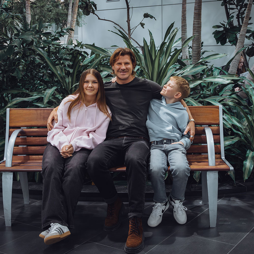 man and his 2 children