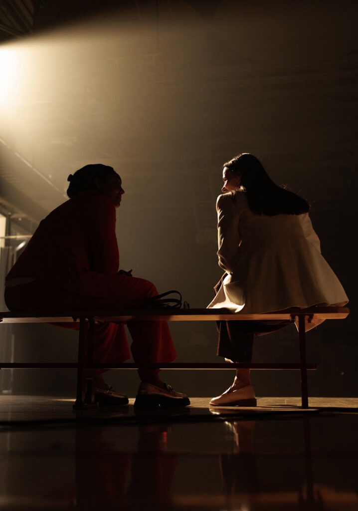 silhouette of a man and woman talking